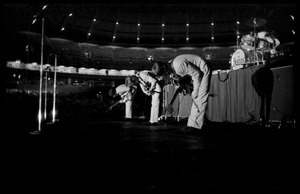 Beatles bowing to the crowd during their concert at the Washington Coliseum