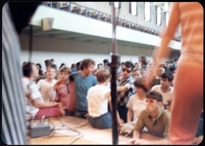 Rapunzel concert, on stage at local school(?): audience