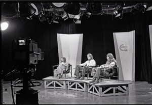 Commune members at the WGBY Catch 44 (public access television) interview: Anne Baker, Jim Baker, and Bruce Geisler on stage
