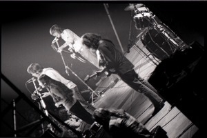 Grateful Dead concert at Springfield Civic Center: band in performance: Bob Weir, Phil Lesh, Jerry Garcia, Donna Godchaux (clockwise from left)