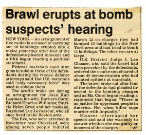 Brawl erupts at bomb suspects' hearing