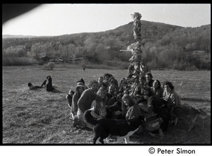 Revelers seated beneath the Maypole, Packer Corners commune