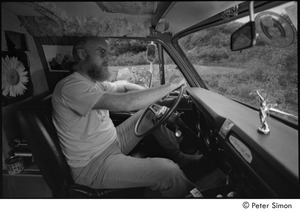 Ram Dass in his van: Ram Dass in the driver's seat