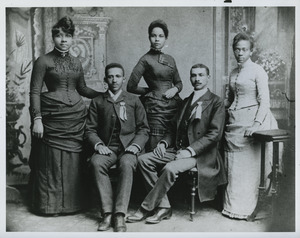 W. E. B. Du Bois seated with classmates from Fisk University