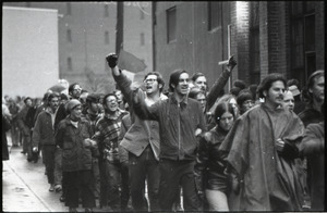 MIT I-Lab demonstration: protesters, some with fists raised, by Instrumentation Laboratory