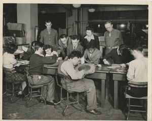 Group of non-commissioned officers watching students in therapy class