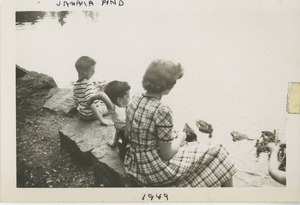 Bernice Kahn with sons Paul and David feeding ducks at Jamaica Pond