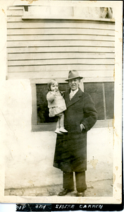 Ricardo Ares holding his daughter, Carmen