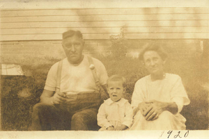 Grandfather and grandmother with first grandchild