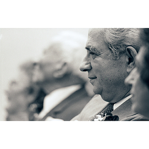 George Kariotis, seated in the audience, at the dedication of Kariotis Hall