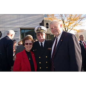 Neal Finnegan poses with two others at the Veterans Memorial dedication