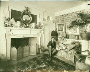 Group portrait of Arthur Little, standing, Anna Palfrey and an unidentified man in the morning room, Arthur Little House, 2 Raleigh Street, Boston, Mass., ca. 1898-1905