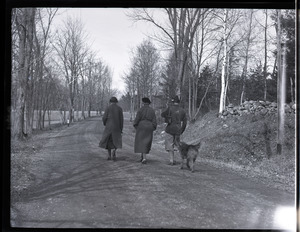 Thomas and Blanche Dreier, unidentified woman walking down a road with a dog