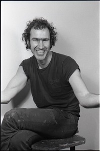 Studio portrait of Richard Safft, seated on a stool