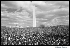 Sea of protesters with Washington Monument in background: Vietnam Moratorium march on Washington