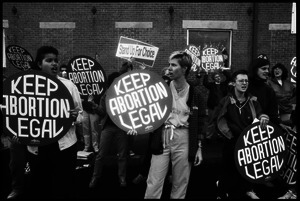 Pro-choice protesters at Planned Parenthood clinic in Providence: demonstrators with 'Keep abortion legal' signs