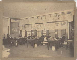 Students from the class of 1899 in a classroom