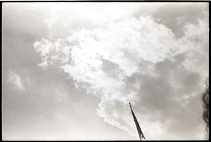 Demonstration at State House against the killings at Kent State: clouds and flagpole