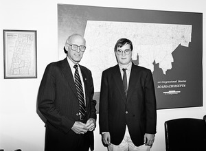 Congressman John W. Olver (left) with visitor, in his congressional office