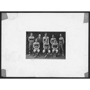 Basketball players posing for a team photo