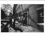 Students walking in front of Suffolk University's College of Business Administration building (45 Mount Vernon Street), photograph, 1972