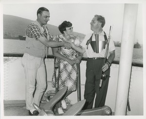 Men shaking hands and woman using crutches