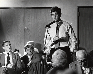 Senate Candidate John Kerry speaking to group, Mayor Raymond L. Flynn seated at left