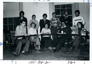 Members of Suffolk University's Finance Association meeting in a classroom, 1978