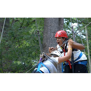 Nadia Alvarez and Ana Hidalgo have trouble on the Torch Scholars Project Adventure Ropes Course