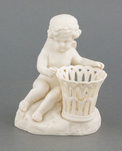 Sculpture of cherub with basket