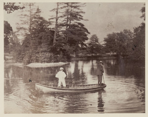 Ronald T. Lyman and "Possie" canoeing at the Lyman estate, Waltham, Mass.