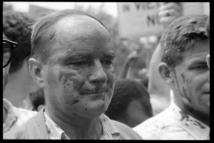 David Dellinger (left) and Staughton Lynd after being splashed with red paint by counter-protesters during the Assembly of Unrepresented People anti-war march