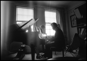 Stephen Stills playing piano in Judy Collins's New York apartment