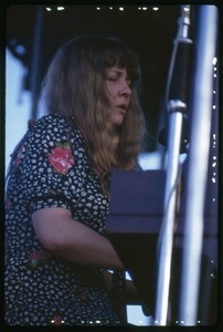 Sandy Denny performing on piano at the Lincoln Folk Festival