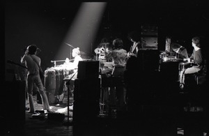 Santana concert at the Springfield Civic Center: view of Carlos Santana and band from rear stage