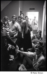 Protesters lining the hallways during the occupation of the University Placement Office, Boston University, opposing on-campus recruiting by Dow Chemical Co.