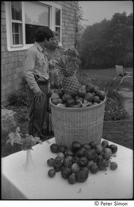 My Wedding: Andrea Simon and Chilmark policeman behind a table laden with fruit