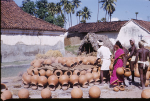 Piling pots to be fired