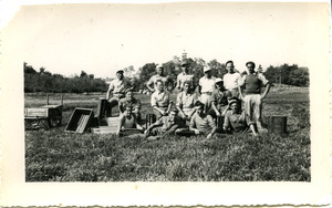 Duxbury Cranberry Company: German prisoners of war from Camp Edwards (Cape Cod) harvesting cranberries, posed with hand scoops and crates