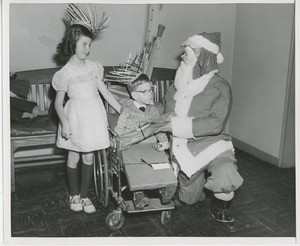 Santa Claus giving gifts to patients