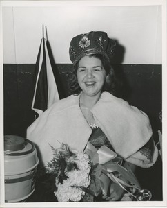 Young woman with crown on boat ride