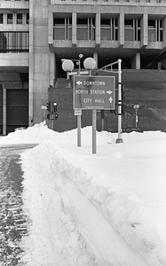 Snow piles beneath Boston City Hall