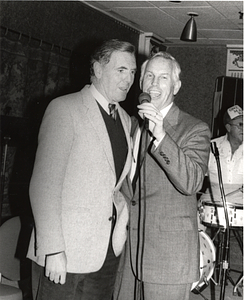 Mayor Raymond L. Flynn and Massachusetts State Treasurer Robert Q. Crane singing