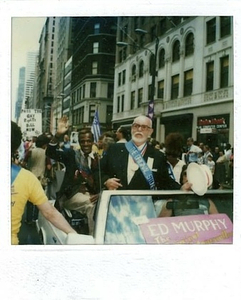 A Photograph of Marsha P. Johnson Waving from a Car at the 1985 Christopher Street Liberation Day Parade with Ed Murphy