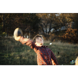 Boy throwing a football