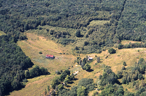 Aerial color image of eastern toe of Taconic Range at Bernardy Farm, abandoned long-distance telephone line visible, and bend Old Petersburg Road.