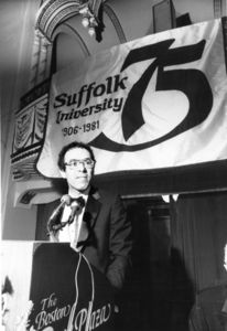 Suffolk University President Daniel H. Perlman (1980-1989) speaking at Law School Alumni Dinner during university's 75th anniversary