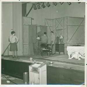 Actors reading lines on stage during a rehearsal of "Three Angels" at Suffolk University's C. Walsh Theatre (55 Temple Street)