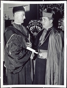 At a special convocation in October 1947 in Bapst auditorium, Father Keleher conferred an honorary LL.D. degree on Boston's auxiliary bishop (later cardinal) John J. Wright ('31)