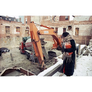 Clara Garcia checks on the progress at the Taino Tower construction site.
